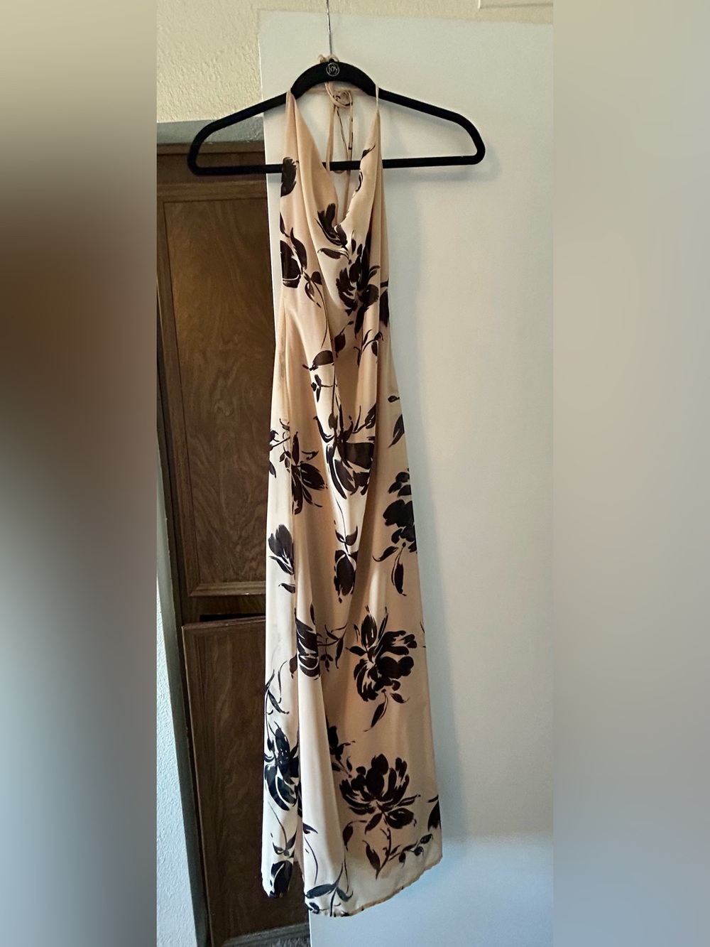 Beige and black halter top cowl neck dress